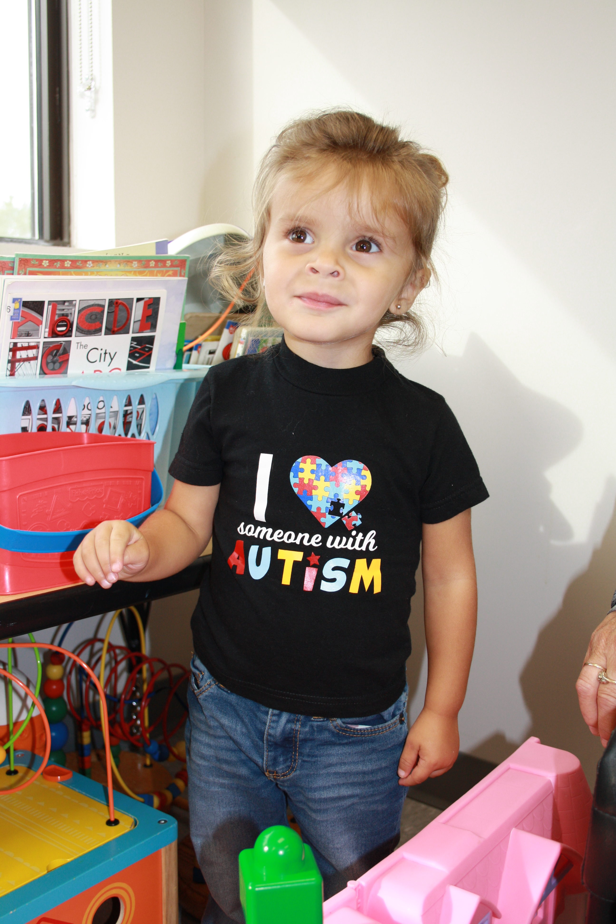Little girl with love someone with autism